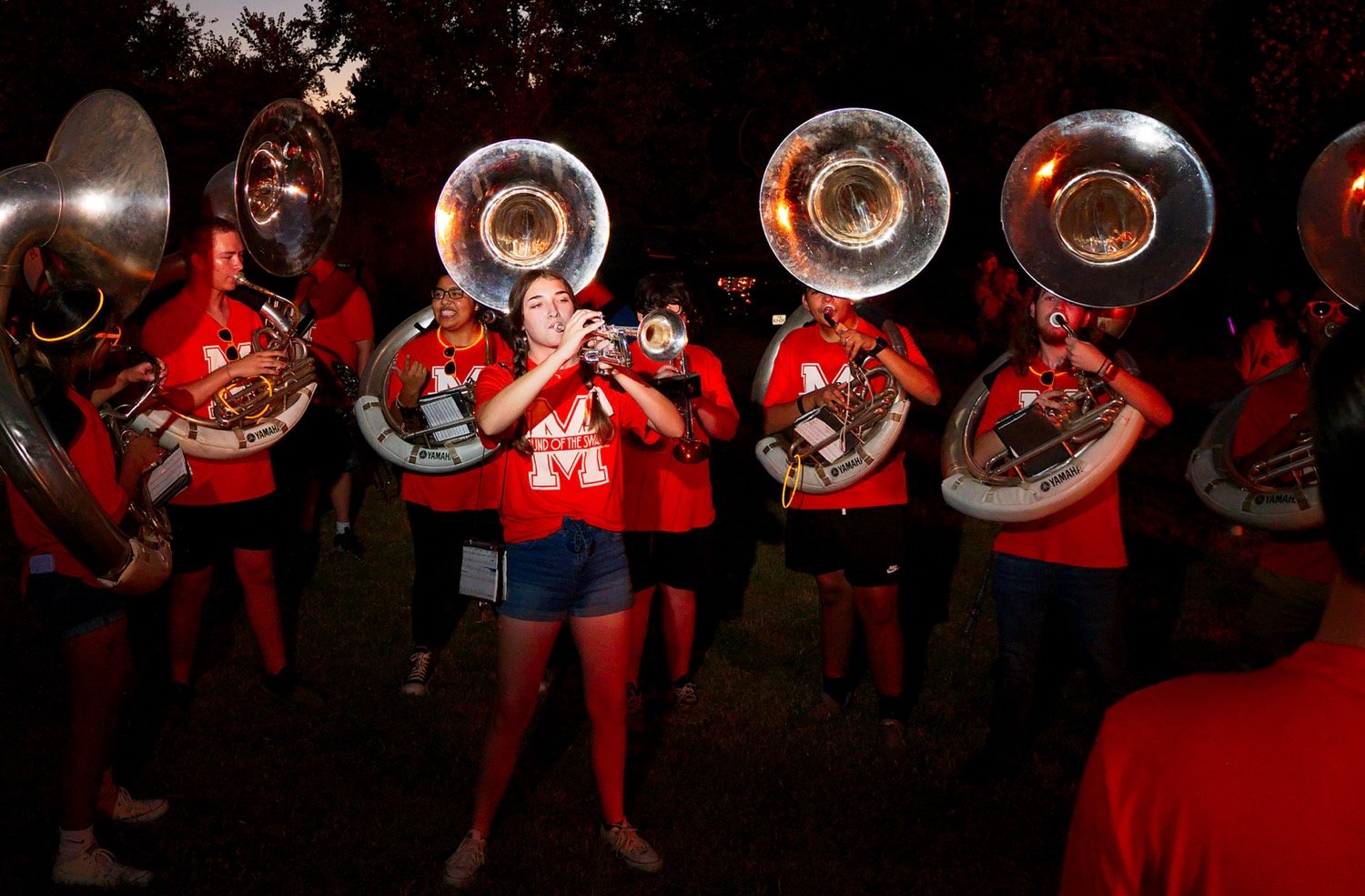 No pep rally is complete without rhythm and tunes, and the Sound of the Swarm brought the sonic entertainment to the bonfire last Wednesday. Here senior trumpeter Ali Jordan, accompanied by the tuba section, serenades the crowd.